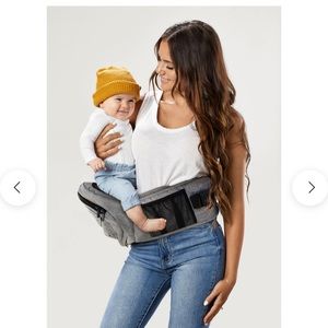 Brand new Tush Baby hip carrier. Color: all black. Photos are from website